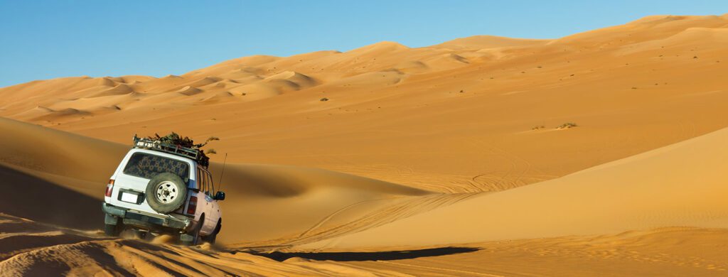 4x4 off-road vehicle driving to Tembaine desert